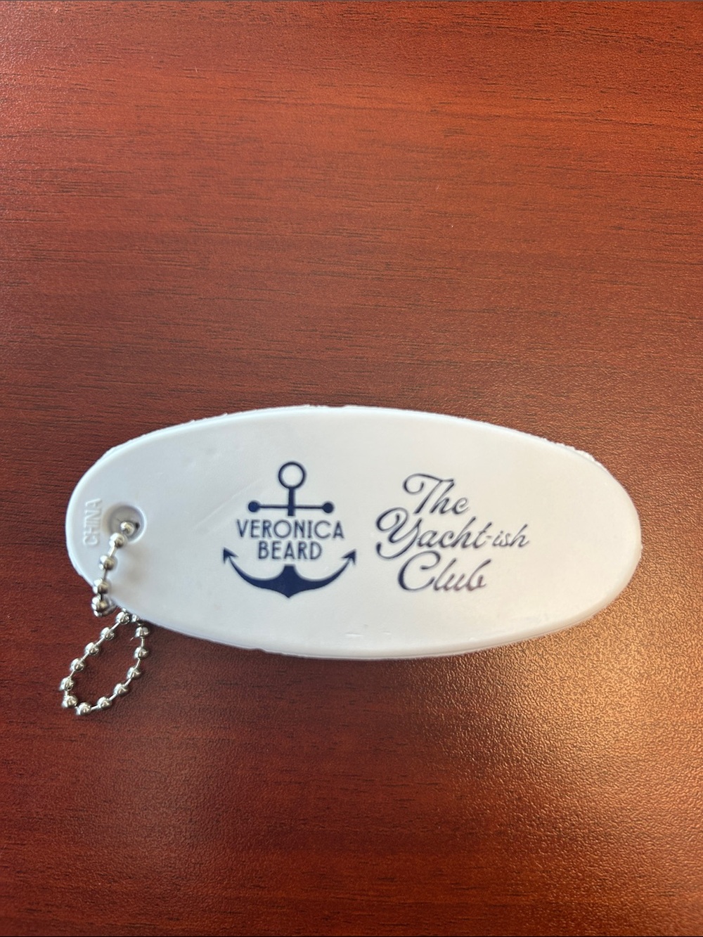 Veronica Beard White Floating Keychain with Navy Logo